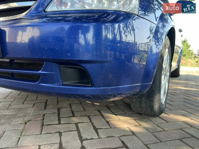 Синий Шевроле Лачетти, объемом двигателя 1.8 л и пробегом 230 тыс. км за 4000 $, фото 15 на Automoto.ua