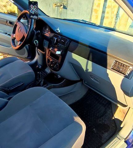 Синий Шевроле Лачетти, объемом двигателя 1.6 л и пробегом 360 тыс. км за 4600 $, фото 6 на Automoto.ua