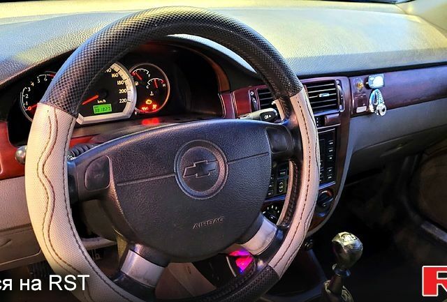 Синий Шевроле Лачетти, объемом двигателя 1.8 л и пробегом 382 тыс. км за 4000 $, фото 1 на Automoto.ua