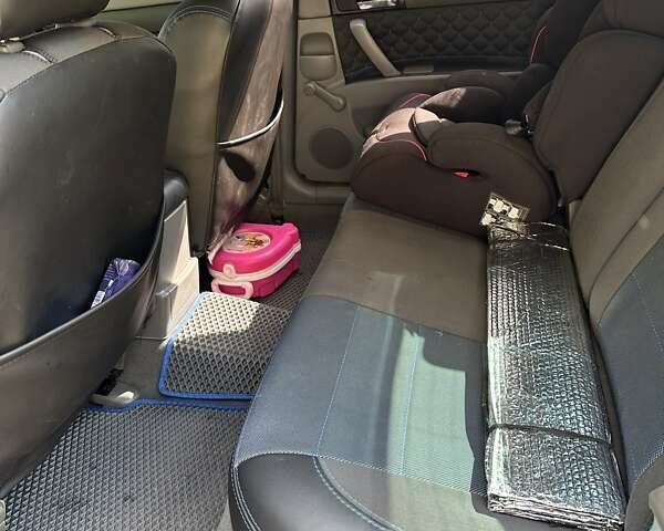 Синий Шевроле Лачетти, объемом двигателя 1.6 л и пробегом 240 тыс. км за 4000 $, фото 9 на Automoto.ua