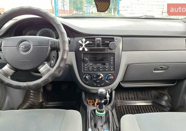 Синий Шевроле Лачетти, объемом двигателя 1.6 л и пробегом 246 тыс. км за 3700 $, фото 10 на Automoto.ua