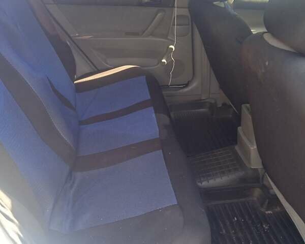 Синий Шевроле Лачетти, объемом двигателя 1.6 л и пробегом 300 тыс. км за 3300 $, фото 5 на Automoto.ua