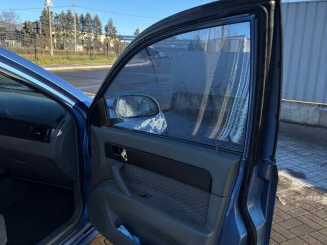 Синий Шевроле Лачетти, объемом двигателя 1.8 л и пробегом 319 тыс. км за 3500 $, фото 5 на Automoto.ua