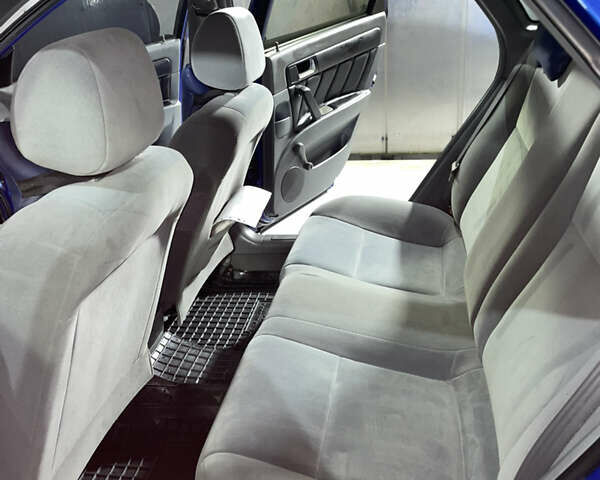 Синій Шевроле Лачетті, об'ємом двигуна 1.8 л та пробігом 251 тис. км за 4200 $, фото 19 на Automoto.ua