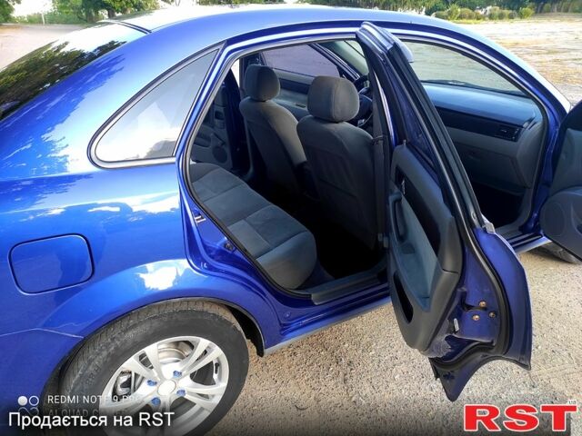 Синій Шевроле Лачетті, об'ємом двигуна 1.8 л та пробігом 0 тис. км за 4000 $, фото 10 на Automoto.ua