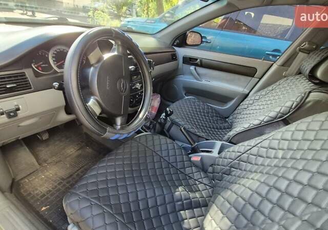 Синий Шевроле Лачетти, объемом двигателя 1.6 л и пробегом 243 тыс. км за 3800 $, фото 17 на Automoto.ua