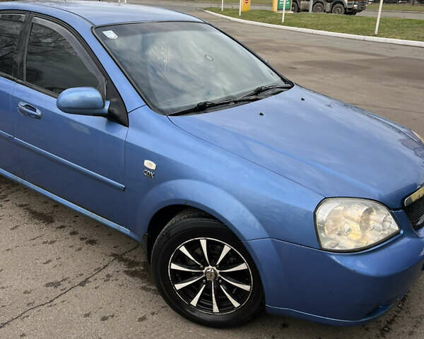 Синій Шевроле Лачетті, об'ємом двигуна 1.8 л та пробігом 407 тис. км за 2999 $, фото 6 на Automoto.ua