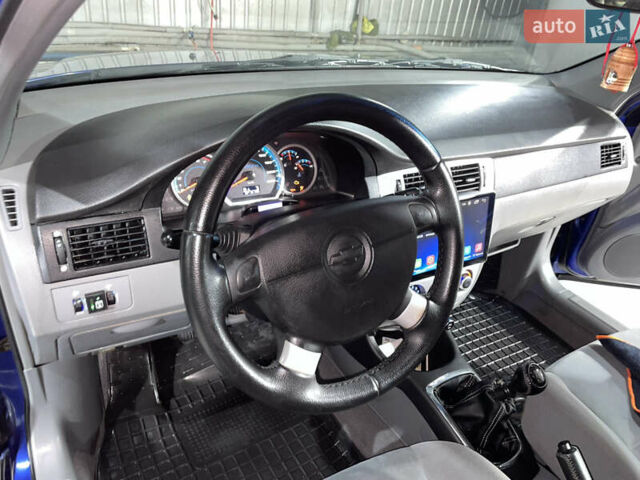 Синій Шевроле Лачетті, об'ємом двигуна 1.8 л та пробігом 251 тис. км за 4200 $, фото 22 на Automoto.ua