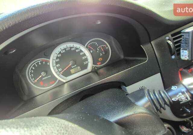 Синий Шевроле Лачетти, объемом двигателя 1.6 л и пробегом 243 тыс. км за 3800 $, фото 19 на Automoto.ua