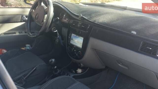 Синий Шевроле Лачетти, объемом двигателя 1.8 л и пробегом 220 тыс. км за 4000 $, фото 11 на Automoto.ua