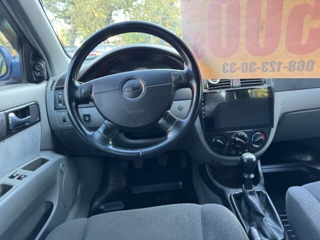 Синій Шевроле Лачетті, об'ємом двигуна 1.8 л та пробігом 226 тис. км за 4250 $, фото 12 на Automoto.ua