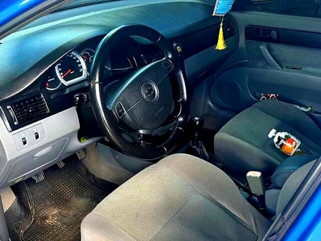 Синий Шевроле Лачетти, объемом двигателя 1.6 л и пробегом 219 тыс. км за 4250 $, фото 5 на Automoto.ua