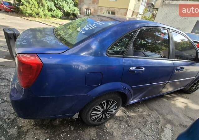 Синий Шевроле Лачетти, объемом двигателя 1.6 л и пробегом 243 тыс. км за 3800 $, фото 6 на Automoto.ua