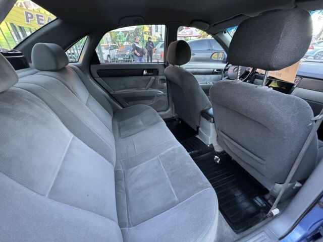 Синій Шевроле Лачетті, об'ємом двигуна 1.8 л та пробігом 226 тис. км за 4250 $, фото 9 на Automoto.ua