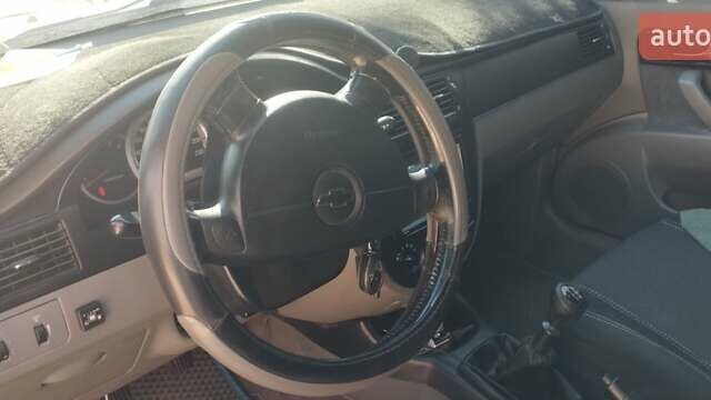 Синий Шевроле Лачетти, объемом двигателя 1.8 л и пробегом 220 тыс. км за 4000 $, фото 3 на Automoto.ua