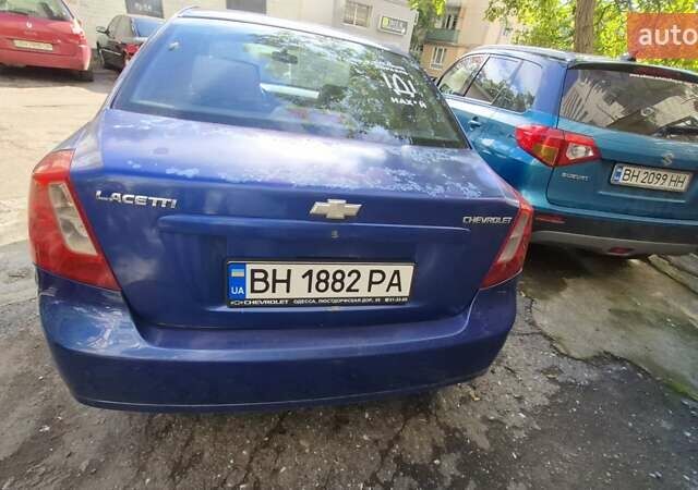 Синий Шевроле Лачетти, объемом двигателя 1.6 л и пробегом 243 тыс. км за 3800 $, фото 3 на Automoto.ua