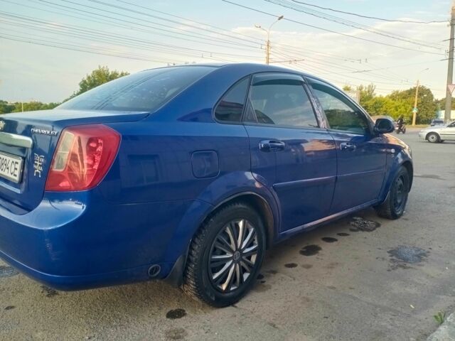 Синий Шевроле Лачетти, объемом двигателя 1.8 л и пробегом 220 тыс. км за 3600 $, фото 5 на Automoto.ua