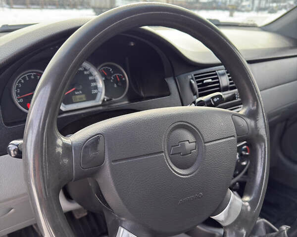 Синий Шевроле Лачетти, объемом двигателя 1.8 л и пробегом 307 тыс. км за 3399 $, фото 11 на Automoto.ua