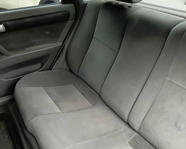 Синій Шевроле Лачетті, об'ємом двигуна 1.8 л та пробігом 298 тис. км за 4800 $, фото 8 на Automoto.ua