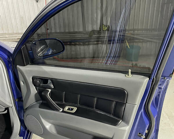 Синій Шевроле Лачетті, об'ємом двигуна 1.8 л та пробігом 251 тис. км за 4200 $, фото 11 на Automoto.ua