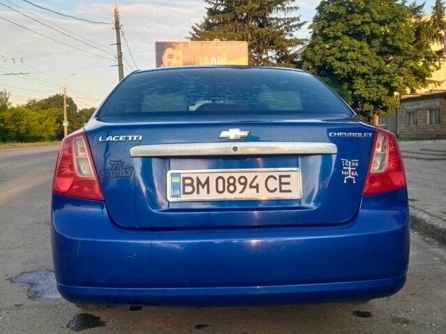 Синий Шевроле Лачетти, объемом двигателя 1.8 л и пробегом 220 тыс. км за 4200 $, фото 2 на Automoto.ua