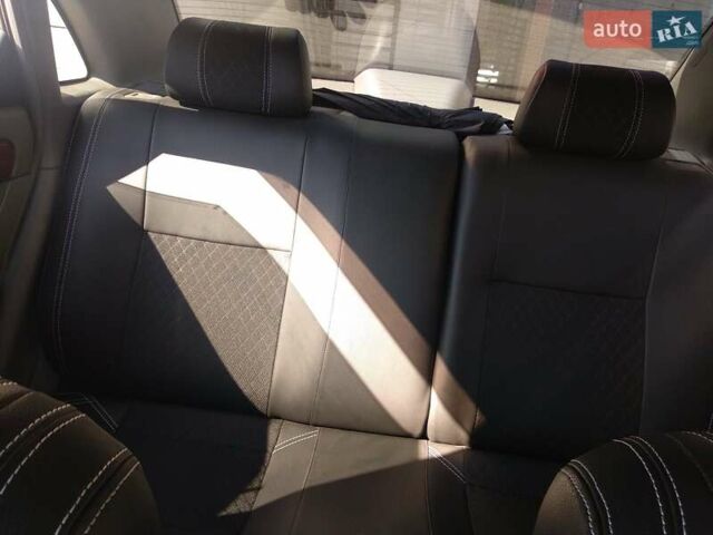 Синий Шевроле Лачетти, объемом двигателя 1.6 л и пробегом 164 тыс. км за 5700 $, фото 5 на Automoto.ua