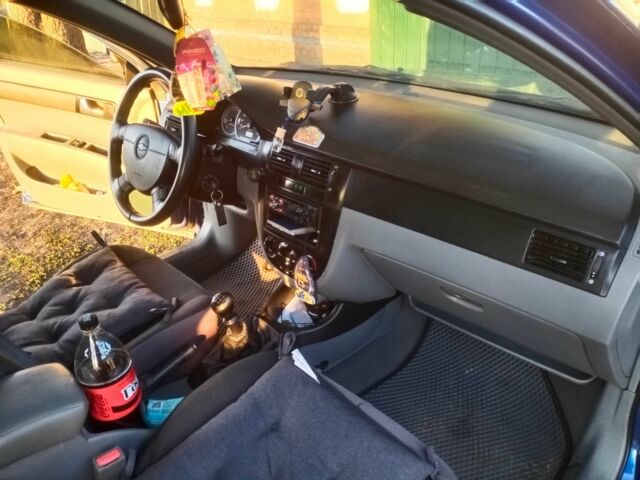 Синий Шевроле Лачетти, объемом двигателя 1.8 л и пробегом 220 тыс. км за 3600 $, фото 6 на Automoto.ua