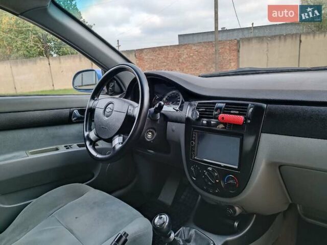 Синий Шевроле Лачетти, объемом двигателя 1.8 л и пробегом 232 тыс. км за 3800 $, фото 13 на Automoto.ua