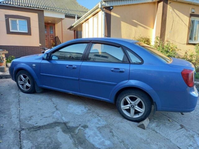 Синій Шевроле Лачетті, об'ємом двигуна 1.8 л та пробігом 247 тис. км за 3250 $, фото 18 на Automoto.ua
