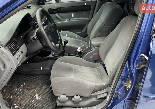 Синий Шевроле Лачетти, объемом двигателя 1.6 л и пробегом 270 тыс. км за 2250 $, фото 9 на Automoto.ua