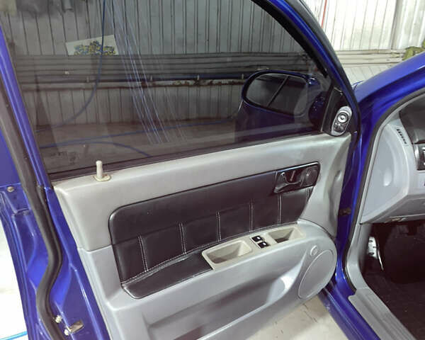 Синій Шевроле Лачетті, об'ємом двигуна 1.8 л та пробігом 251 тис. км за 4200 $, фото 21 на Automoto.ua