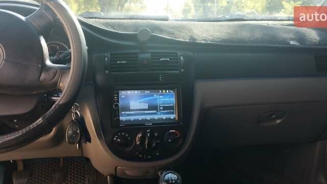 Синий Шевроле Лачетти, объемом двигателя 1.8 л и пробегом 220 тыс. км за 4000 $, фото 12 на Automoto.ua