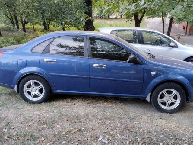 Синій Шевроле Лачетті, об'ємом двигуна 1.6 л та пробігом 198 тис. км за 4200 $, фото 2 на Automoto.ua