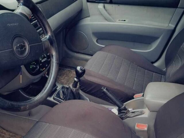 Синій Шевроле Лачетті, об'ємом двигуна 1.8 л та пробігом 247 тис. км за 3250 $, фото 19 на Automoto.ua