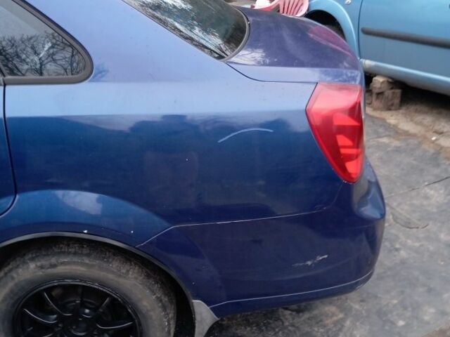 Синий Шевроле Лачетти, объемом двигателя 1.6 л и пробегом 270 тыс. км за 1900 $, фото 2 на Automoto.ua