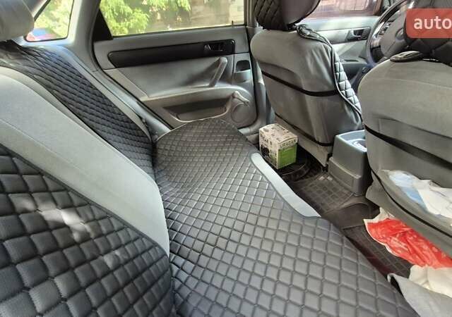 Синий Шевроле Лачетти, объемом двигателя 1.6 л и пробегом 243 тыс. км за 3800 $, фото 15 на Automoto.ua