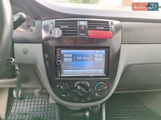 Синий Шевроле Лачетти, объемом двигателя 1.8 л и пробегом 232 тыс. км за 3800 $, фото 15 на Automoto.ua