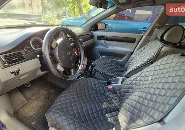 Синий Шевроле Лачетти, объемом двигателя 1.6 л и пробегом 243 тыс. км за 3800 $, фото 18 на Automoto.ua