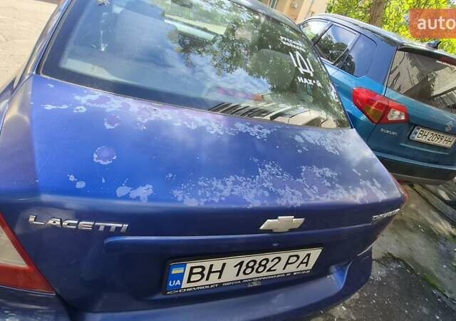 Синий Шевроле Лачетти, объемом двигателя 1.6 л и пробегом 243 тыс. км за 3800 $, фото 8 на Automoto.ua