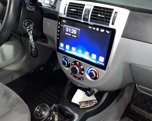 Синій Шевроле Лачетті, об'ємом двигуна 1.8 л та пробігом 251 тис. км за 4200 $, фото 13 на Automoto.ua