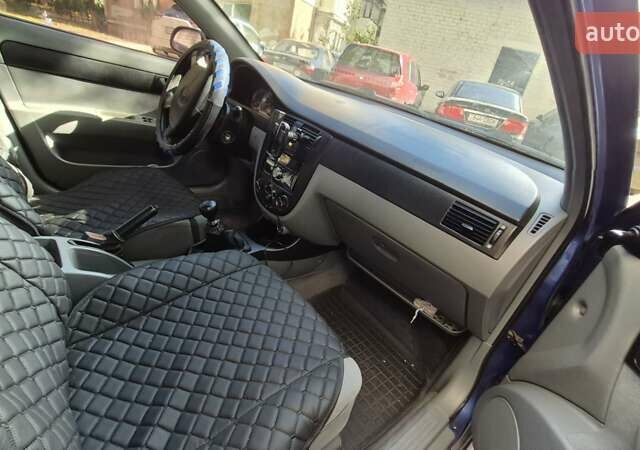 Синий Шевроле Лачетти, объемом двигателя 1.6 л и пробегом 243 тыс. км за 3800 $, фото 11 на Automoto.ua