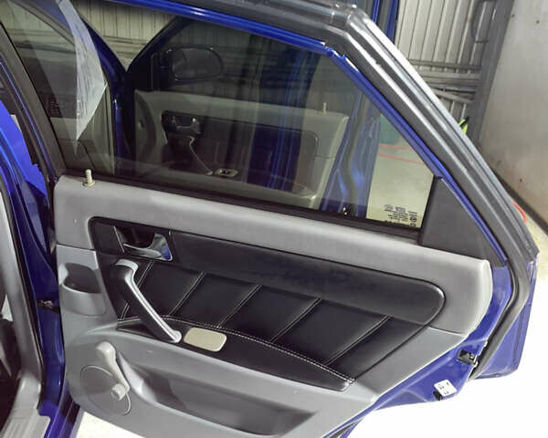 Синій Шевроле Лачетті, об'ємом двигуна 1.8 л та пробігом 251 тис. км за 4200 $, фото 16 на Automoto.ua