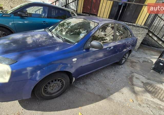 Синий Шевроле Лачетти, объемом двигателя 1.6 л и пробегом 243 тыс. км за 3800 $, фото 9 на Automoto.ua