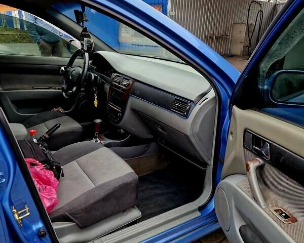 Синий Шевроле Лачетти, объемом двигателя 1.8 л и пробегом 260 тыс. км за 4000 $, фото 12 на Automoto.ua