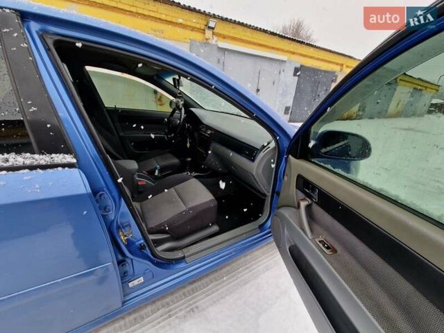 Синий Шевроле Лачетти, объемом двигателя 1.8 л и пробегом 260 тыс. км за 4000 $, фото 13 на Automoto.ua