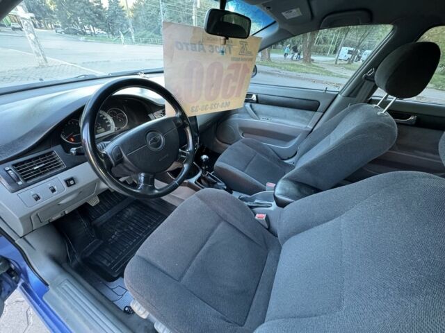 Синій Шевроле Лачетті, об'ємом двигуна 1.8 л та пробігом 226 тис. км за 4250 $, фото 7 на Automoto.ua