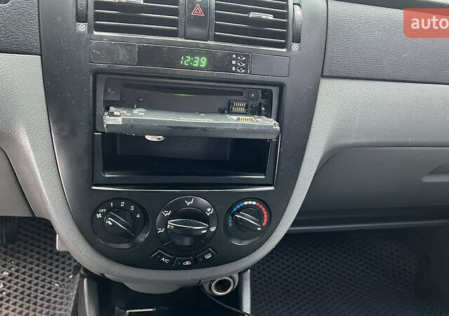 Синий Шевроле Лачетти, объемом двигателя 1.6 л и пробегом 270 тыс. км за 2250 $, фото 11 на Automoto.ua