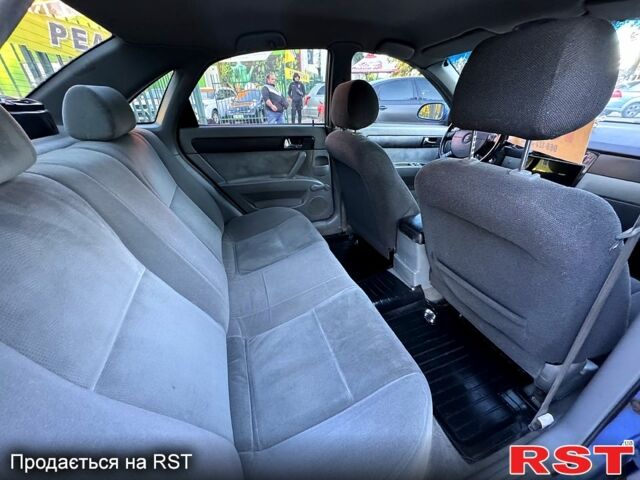 Синій Шевроле Лачетті, об'ємом двигуна 1.8 л та пробігом 226 тис. км за 4250 $, фото 5 на Automoto.ua