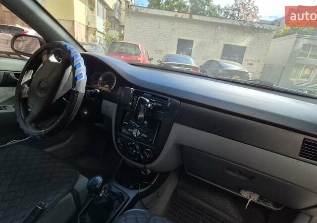 Синий Шевроле Лачетти, объемом двигателя 1.6 л и пробегом 243 тыс. км за 3800 $, фото 12 на Automoto.ua