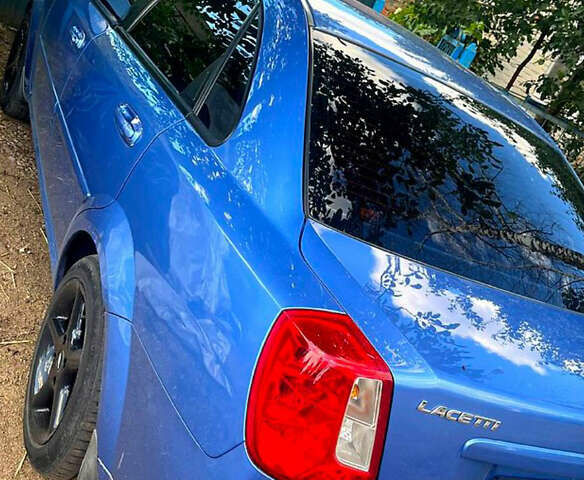 Синий Шевроле Лачетти, объемом двигателя 1.6 л и пробегом 219 тыс. км за 4250 $, фото 6 на Automoto.ua
